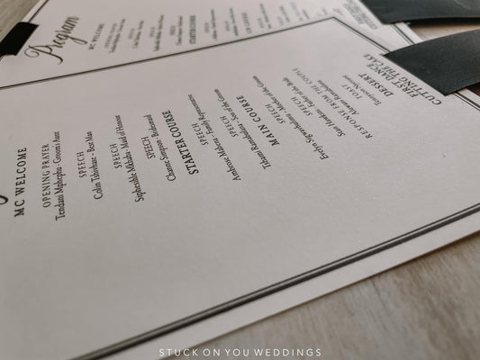 Elegant Program with Black Ribbon Detail