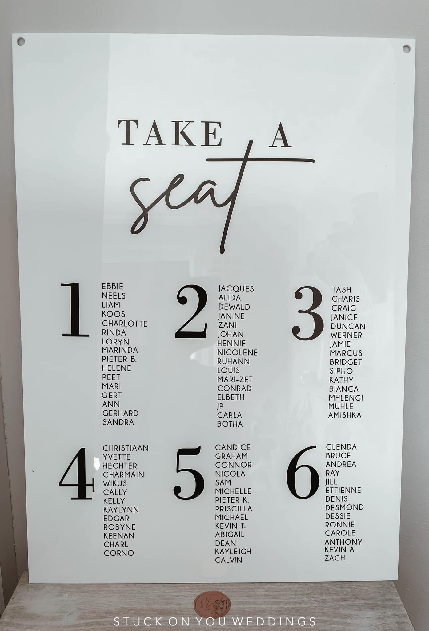 White Acrylic Seating Board with Black Vinyl Application